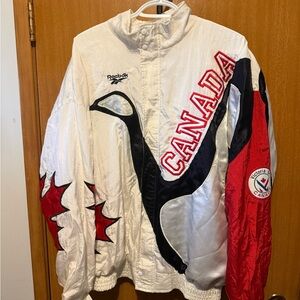 Reebok White Jacket with Blue and Red Commonwealth Games Graphics